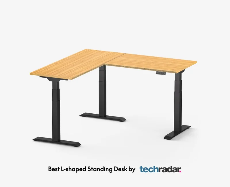 FlexiSpot E7L 3-leg L-shaped standing desk with natural bamboo surface and electric dual-motor frame