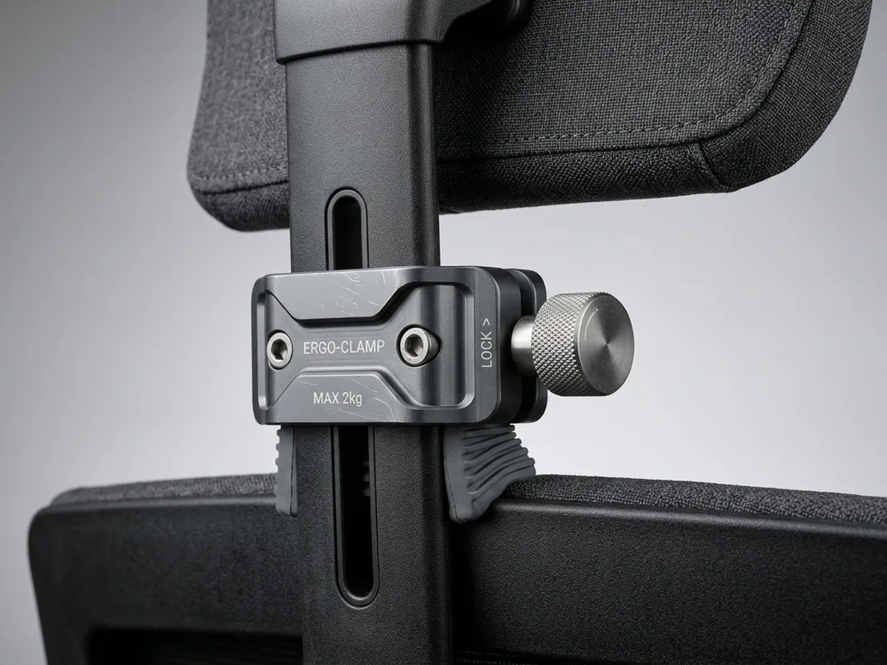 Precision aluminum clamp of the Atlas Headrest mounted on Herman Miller Embody spine